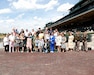 Pictured here is the winner’s circle after Race 1, featuring our dedicated Volunteers, Kentucky Teen Council members, and Family Programs staff—all of whom play a vital role in supporting our Soldiers and their families.