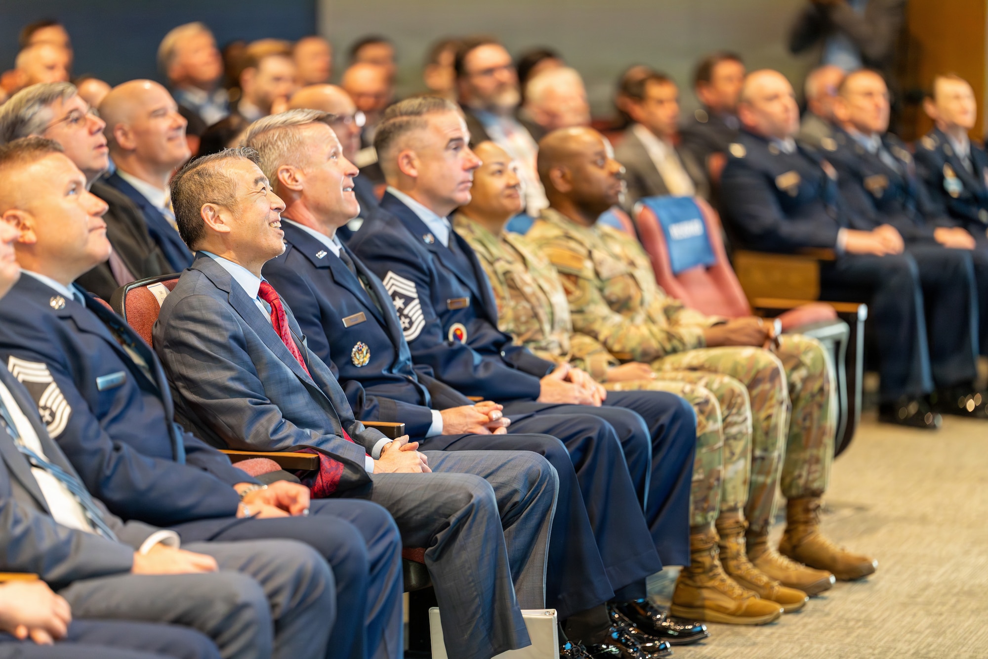 Edwin H. Oshiba, a member of the Senior Executive Service and Administrative Assistant to the Secretary of the Air Force, attends opening remarks alongside Air University and 42nd Air Base Wing senior leaders during the National Security Forum at Maxwell Air Force Base, Alabama, May 5, 2026