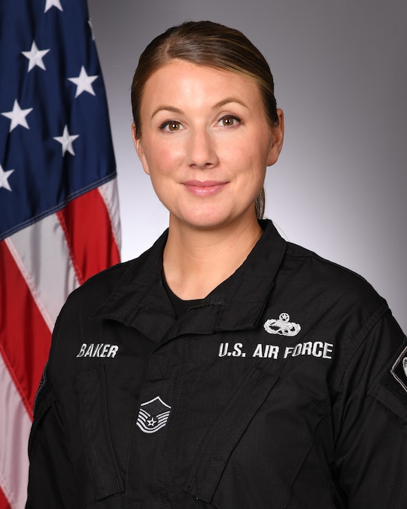 A studio portrait of a member of the F-16 Viper Demonstration Team.
