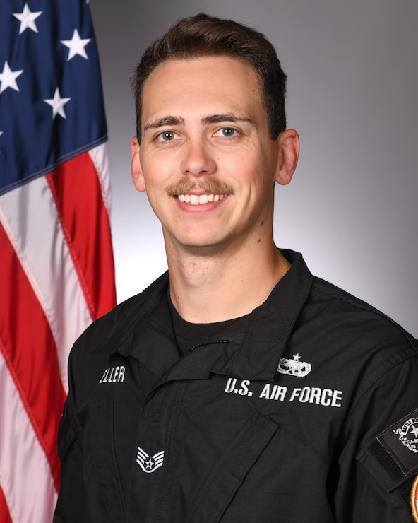 A studio portrait of a member of the F-16 Viper Demonstration Team.