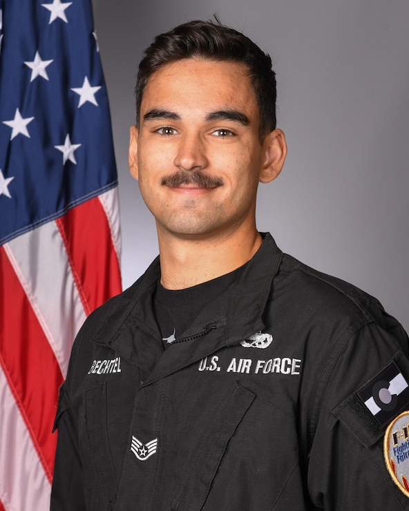 A studio portrait of a member of the F-16 Viper Demonstration Team.