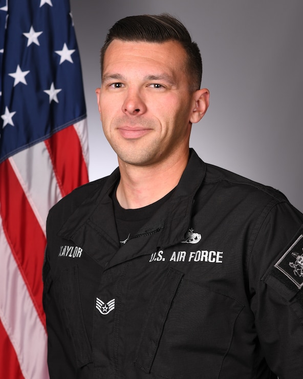 Studio photo of a uniformed member of the F-16 Viper Demonstration Team.