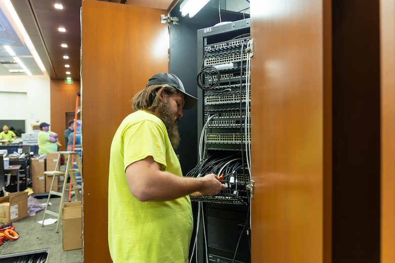Man working on electronics.