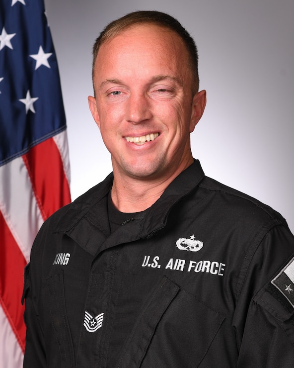 Studio photo of a uniformed member of the F-16 Viper Demonstration Team.