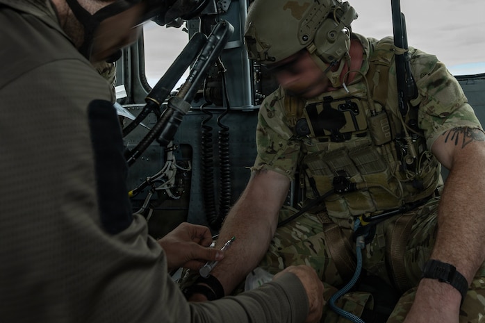 person giving IV