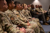 U.S. Air Force Airmen attend a mission transfer ceremony as the 690th Intelligence Support Squadron merged with the 794th Communications Squadron on Joint Base Anacostia-Bolling, Washington, D.C., May 1, 2026. Members from both units formed a new flight, the 794th Cyber Protection Squadron, to provide increased technological capabilities for the National Capital Region. (U.S. Air Force photo by Senior Airman Shanel Toussaint)