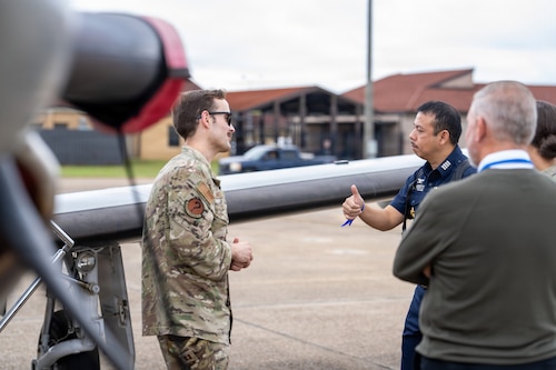 A U.S. Air Force service member speaks with National Security Forum and Gathering of Eagles attendees during an Airpower demonstration at Maxwell Air Force Base, Alabama, May 6, 2026.