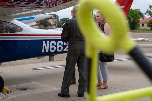 A National Security Forum and Gathering of Eagles attendee speaks with a pilot during an Airpower demonstration at Maxwell Air Force Base, Alabama, May 6, 2026.