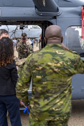 National Security Forum and Gathering of Eagles attendees receive a briefing beside a U.S. Air Force aircraft during an Airpower demonstration at Maxwell Air Force Base, Alabama, May 6, 2026.