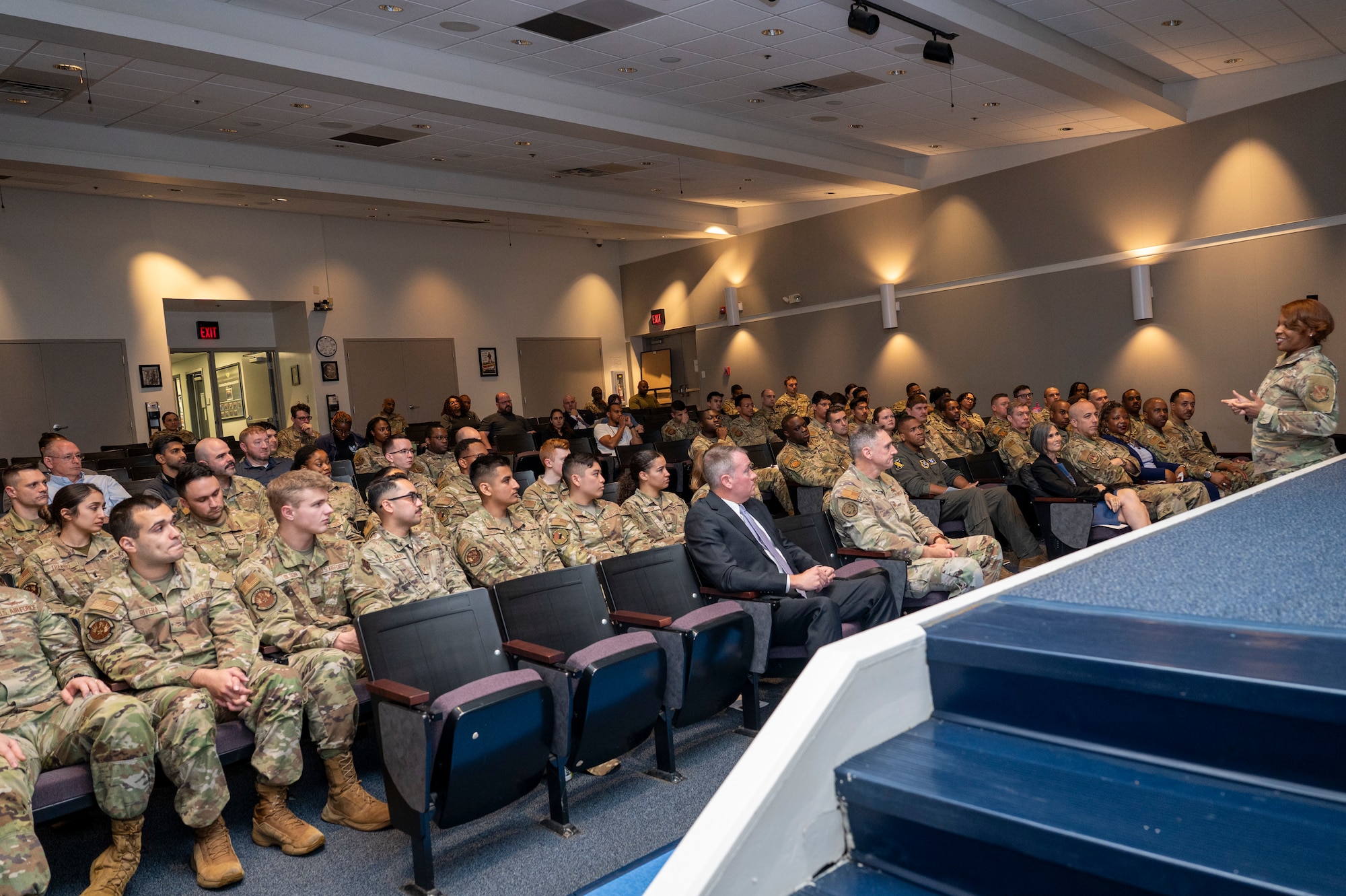 U.S. Air Force Airmen listen to their new acting commander, U.S. Air Force Col. Jontae McGrew, commander of the 844th Communications Group, during a mission transfer ceremony for the 690th Intelligence Support Squadron merger with the 794th Communications Squadron on Joint Base Anacostia-Bolling, Washington, D.C., May 1, 2026. Combined members from both units will form a new flight, 794th Cyber Protection, to provide increased technological capabilities to the National Capital Region.