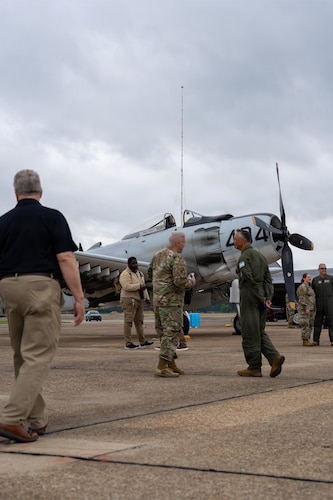 National Security Forum and Gathering of Eagles attendees walk the flight line near a U.S. Air Force aircraft during an Airpower demonstration at Maxwell Air Force Base, Alabama, May 6, 2026.
