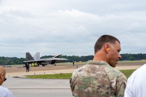 National Security Forum and Gathering of Eagles attendees observe an F-22 Raptor aircraft assigned to the F-22 Demonstration Team during an Airpower demonstration at Maxwell Air Force Base, Alabama, May 6, 2026.