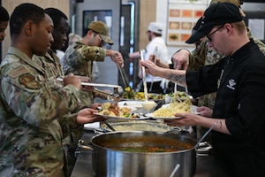 22nd Force Support Squadron Airmen plate their food during a luncheon at the Redler Institute of Culinary Arts in Andover, Kansas, April 28, 2026. Airmen received expert instruction during a collaborative event hosted by Redler which culminated with a feast of the food that the Airmen prepared. (U.S. Air Force photo by Senior Airman Amelio Brown)