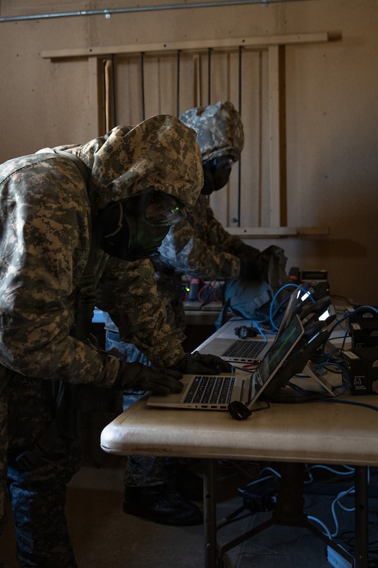 U.S. Marine Corps Pfc. Marco Torres, left, a data systems administrator and Washington native, and Pfc. Kalieah White, a network administrator and California native, both with 9th Communication Battalion, I Marine Expeditionary Force Information Group, establish computer network during an expeditionary field exercise at Marine Corps Base Camp Pendleton, California, April 28, 2026. The exercise sets realistic conditions for 9th Comm Bn. to validate essential capabilities, requiring detachments to quickly deploy, maintain and defend communications networks and critical infrastructure in a simulated expeditionary environment. (U.S. Marine Corps photo by Lance Cpl. Theresa Lizarde)
