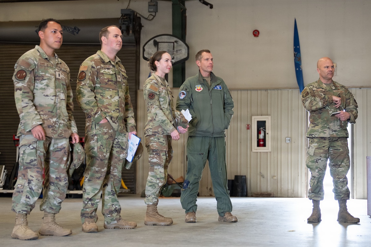 A group of Airmen stand together