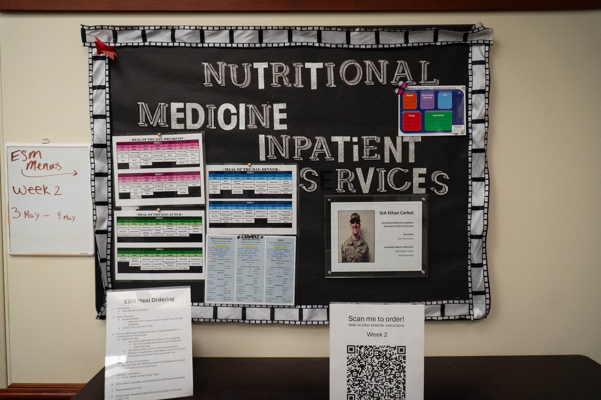 An informational board displays inpatient nutritional service tracking on Joint Base Elmendorf-Richardson, Alaska, March 27, 2026. The Nutritional Medicine Flight utilizes these specialized tools to coordinate dietary requirements and ensure precise medical nutrition therapy for patients across the installation's medical facility. (U.S. Air Force photo by Airman 1st Class Keola Vischi)