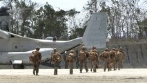 U.S. Marines assigned to 1st Battalion, 5th Marine Regiment, Marine Rotational Force – Darwin, prepare to embark on an MV-22B Osprey assigned to Marine Medium Tiltrotor Squadron 268, MRF-D 26, after completing an airfield seizure as a part of Exercise Balikatan 2026 at Balabac Island, Philippines, May 3, 2026.