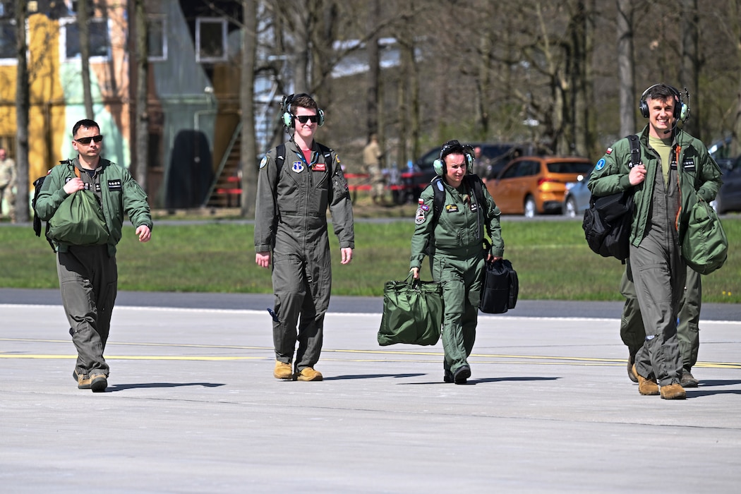 Members assigned to the 180th Airlift Squadron and Polish forces participate during Rodeo Day in support of Hussar Saber 26-1.