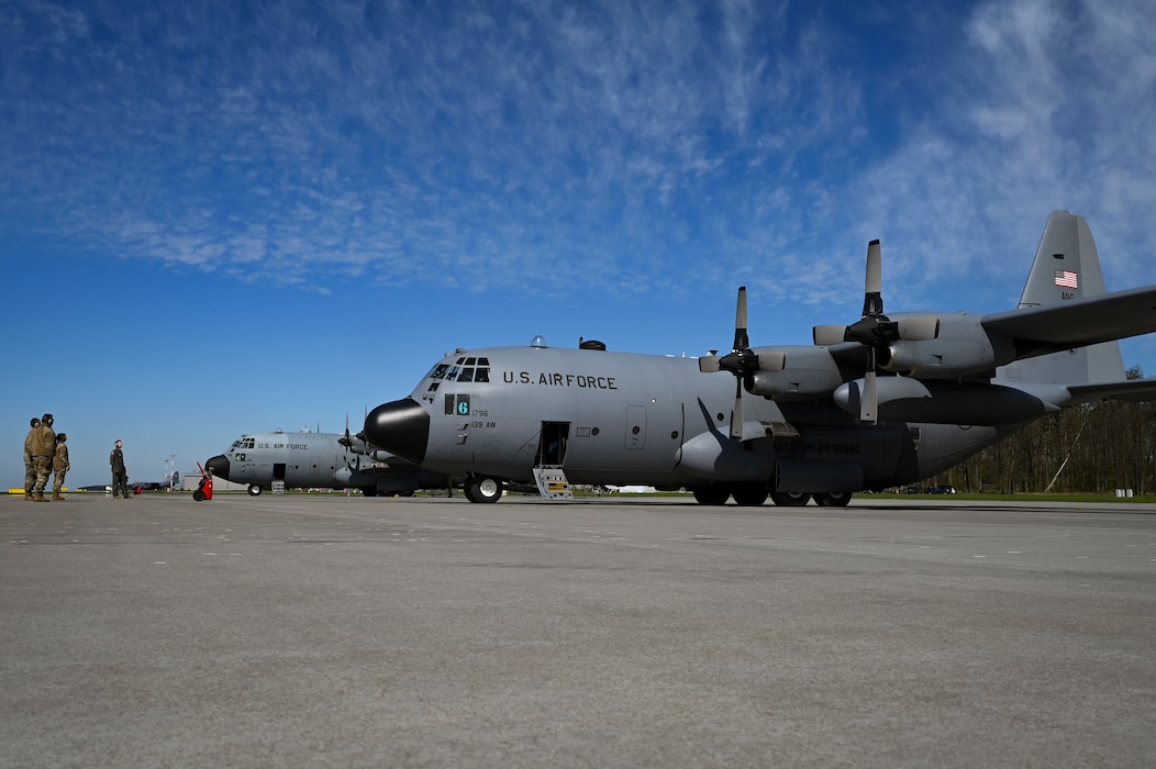 Crews work on C-130H Hercules aircraft assigned to the 139th Airlift Wing during Hussar Saber 26-1.