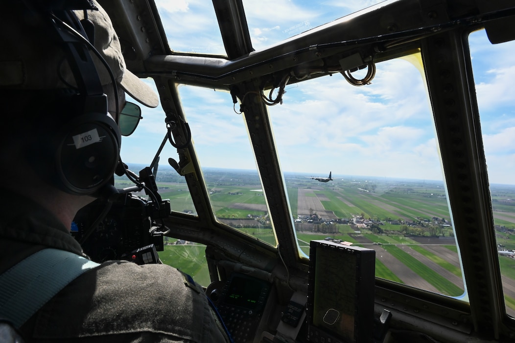U.S. Air Force 1st Lt. David Kocher, 180th Airlift Squadron pilot, flies over Polish skies on a C-130H Hercules aircraft during Hussar Saber 26-1.