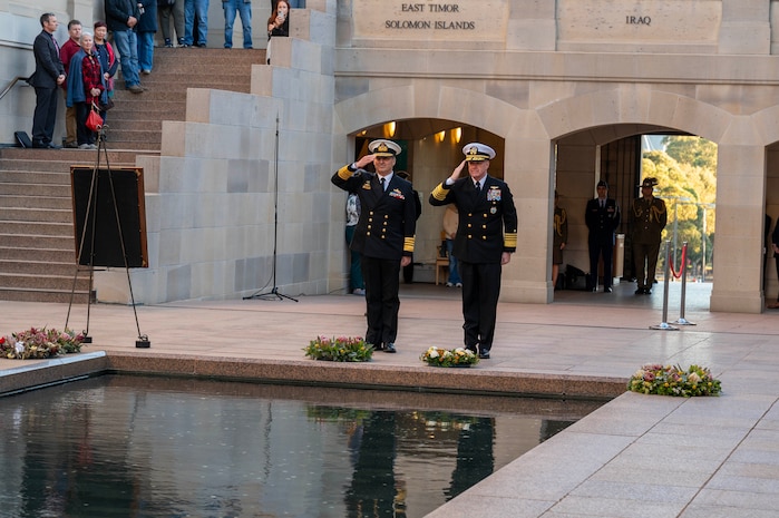 Adm. David Johnston AC RAN, Chief of the Australian Defence Force, left, and Adm. Samuel J. Paparo, commander of U.S. Indo-Pacific Command, render a salute during the Last Post ceremony at the Australian War Memorial in Canberra, Australia, May 6, 2026. USINDOPACOM is committed to enhancing stability in the Indo-Pacific region by promoting security cooperation, encouraging peaceful development, responding to contingencies, deterring aggression and, when necessary, prevailing in conflict. (U.S. Navy photo by Mass Communication Specialist 1st Class Ryan D. McLearnon)