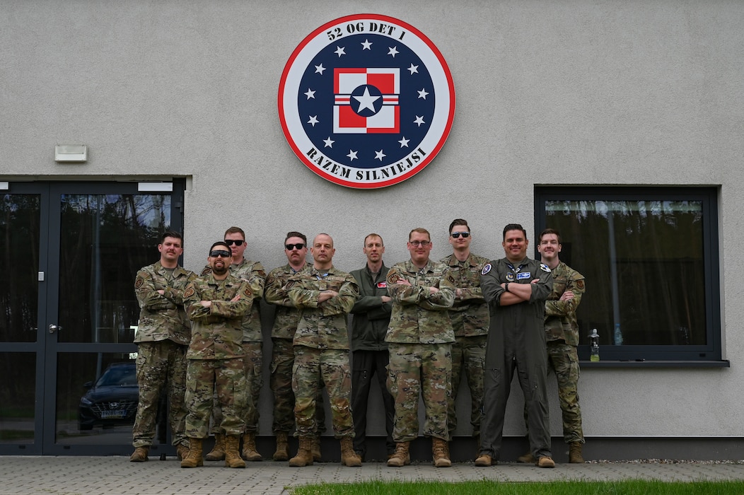 U.S. Air Force Airmen assigned to the 52nd Operations Group, Detachment 1, pose for a photo during Hussar Saber 26-1.