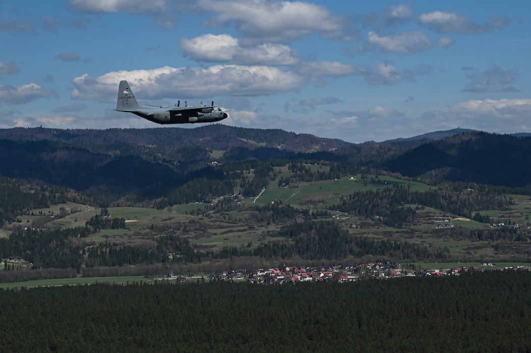 A C-130H Hercules aircraft from the 139th Airlift Wing, Missouri Air National Guard, flies over the skies of Poland during Hussar Saber 26-1.