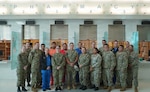 The U.S. Naval Hospital Guam Pharmacy team poses for a group photo to recognize their selection as the U.S. Navy Pharmacy Team of the Year for fiscal year 2025. The award was announced during a ceremony at the Joint Federal Pharmacy Seminar Nov. 1, 2025. This prestigious award recognizes the team’s outstanding contributions to operational readiness, patient care, and process improvement, solidifying their role as a cornerstone of pharmaceutical support in the Indo-Pacific Command (INDOPACOM) area of responsibility.
