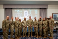 U.S. Air Force 1st Sergeants and from the National Capital Region and leadership from Joint Base Anacostia-Bolling gather for a photo with Chief Master Sergeant of the Air Force David R. Wolfe after an all call at JBAB, Washington, D.C., on May 6, 2026. The call provided Airmen an opportunity to directly engage with the top enlisted leader in the Air Force, ask questions, and gain insight on the direction of the force. (U.S. Air Force photo by Senior Airman Shanel Toussaint)