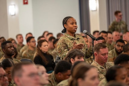 U.S. Air Force Tech. Sgt. Crystyle Caviness-Jules, project manager from 794th Communications Squadron, asks a question during an All Call with Chief Master Sergeant of the Air Force David Wolfe at Joint Base Anacostia-Bolling, Washington, D.C., on May 6, 2026. During the call, the floor was open for Airmen to ask questions about the evolving mission and priorities of the force. (U.S. Air Force photo by Senior Airman Shanel Toussaint)