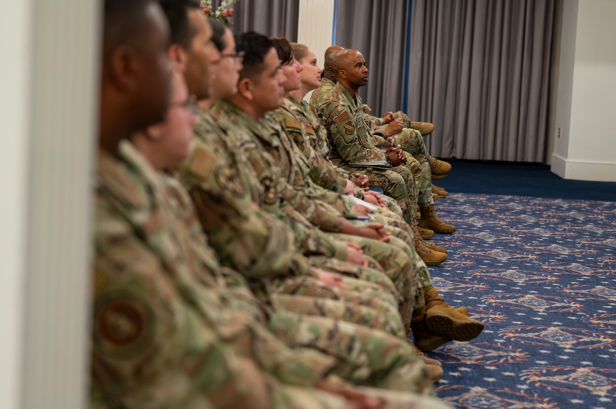 Airmen listen during an All Call with Chief Master Sergeant of the Air Force David R. Wolfe at Joint Base Anacostia-Bolling, Washington, D.C., on May 6, 2026. During the call, Wolfe touched on the Air Force priorities of readiness, modernization, and Airmen and families. (U.S. Air Force photo by Senior Airman Shanel Toussaint)