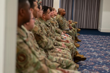 Airmen listen during an All Call with Chief Master Sergeant of the Air Force David R. Wolfe at Joint Base Anacostia-Bolling, Washington, D.C., on May 6, 2026. During the call, Wolfe touched on the Air Force priorities of readiness, modernization, and Airmen and families. (U.S. Air Force photo by Senior Airman Shanel Toussaint)