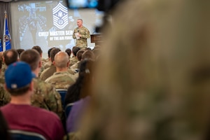 Chief Master Sergeant of the Air Force David R. Wolfe addresses Airmen at Joint Base Anacostia-Bolling, Washington, D.C., on May 6, 2026. The call provided Airmen an opportunity to directly engage with the top enlisted leader in the Air Force, ask questions, and gain insight on the direction of the force. (U.S. Air Force photo by Senior Airman Shanel Toussaint)