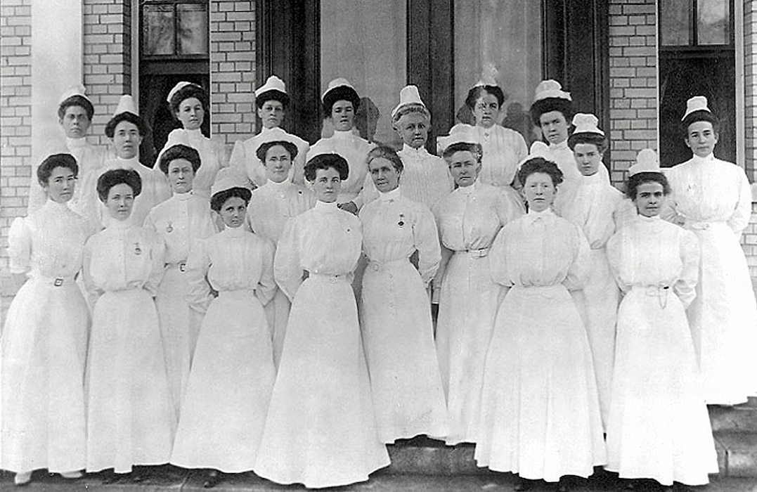 Image of nurses posing for a photo.