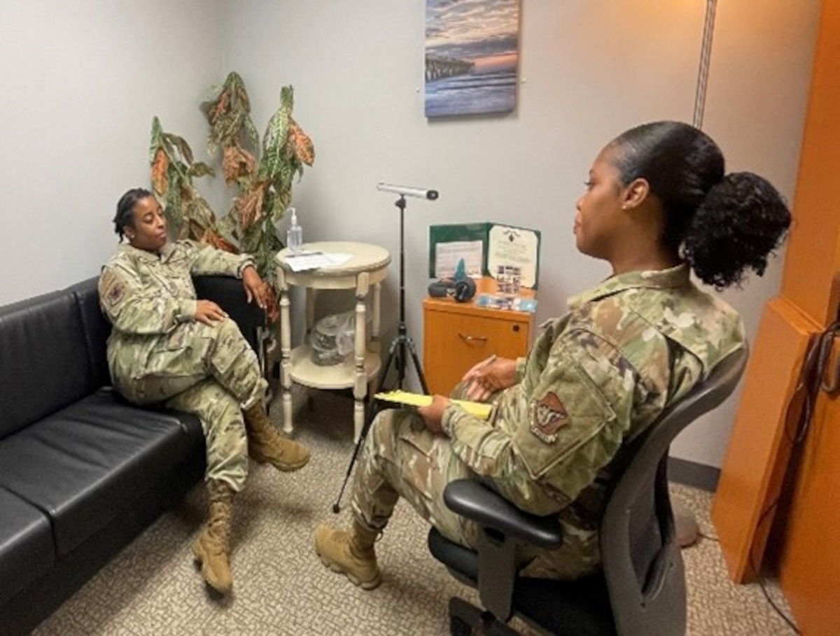 Image of Airmen having a conversation.