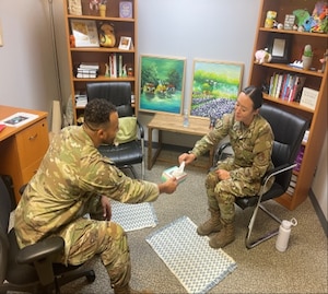 Image of Airmen having a conversation.