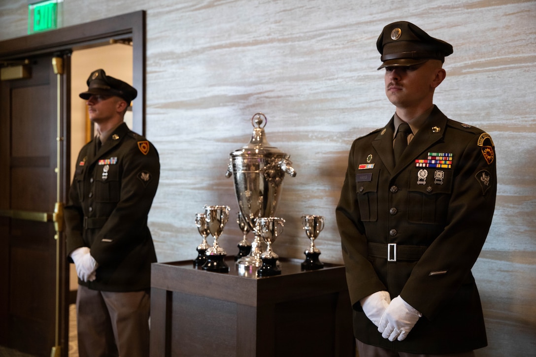 Spc. Jacob Thomas and Spc. Brendan Hays of the 617th Military Police Company guard the winner's trophy the 152nd running of the Kentucky Derby at Churchill Downs in Louisville, Kentucky, May 2, 2026.