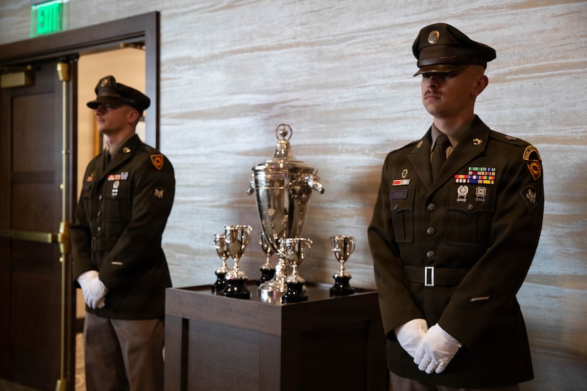 Spc. Jacob Thomas and Spc. Brendan Hays of the 617th Military Police Company guard the winner's trophy the 152nd running of the Kentucky Derby at Churchill Downs in Louisville, Kentucky, May 2, 2026.