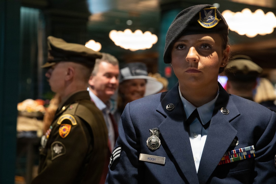 Spc Brendan of the 617th Military Police Company and Senior Airman Rebecca Koch of the 123rd Security Forces Squadron guard the winner's trophy on display in the Mansion at Churchill Downs for the 152nd running of the Kentucky Derby in Louisville, Kentucky, May 2, 2026.