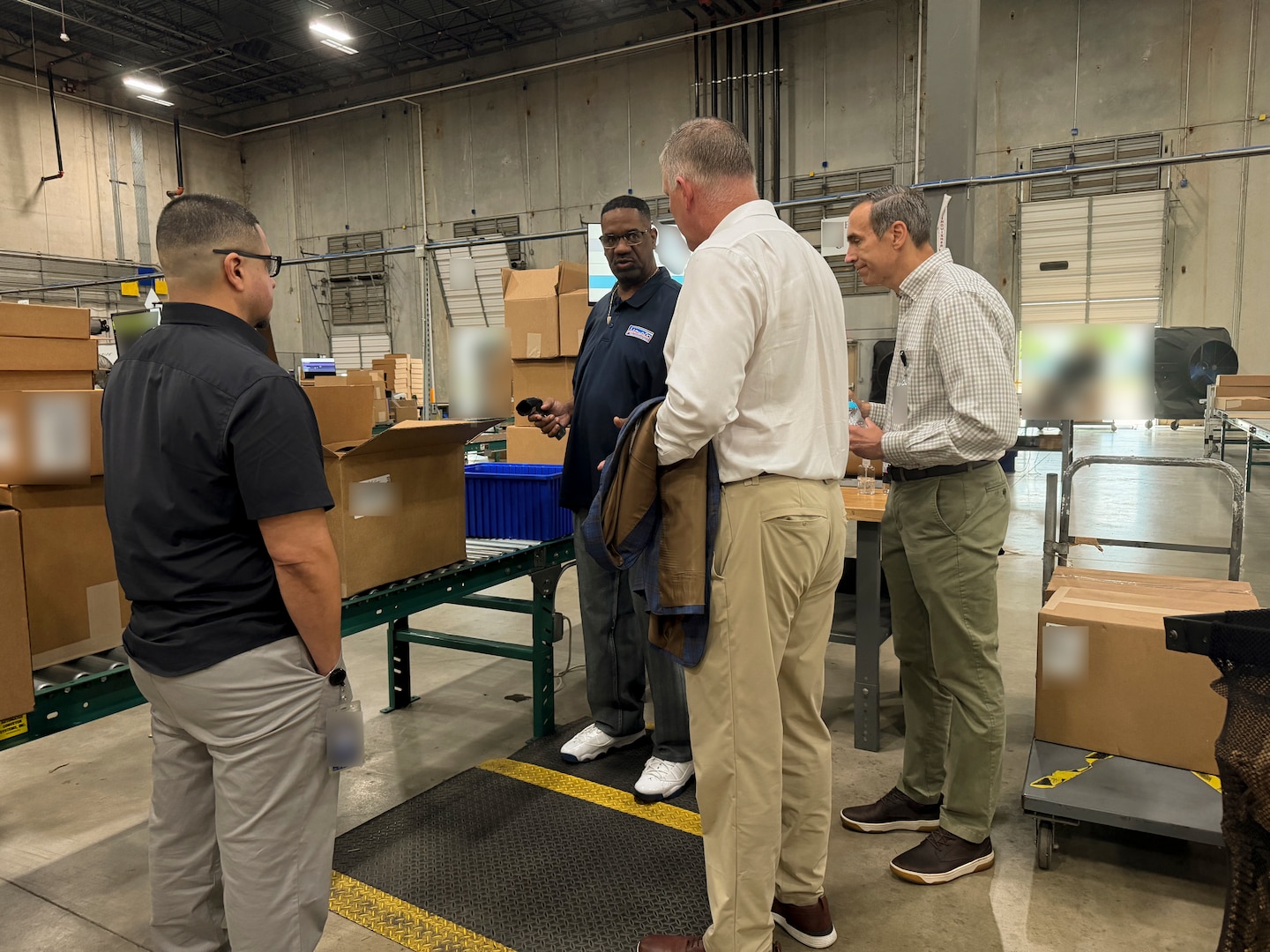 Leadership and subject matter experts from Defense Logistics Agency Troop Support and the Travis Association for the Blind stand together during a facility walkthrough in Austin, Texas, April 30, 2026. The collaborative visit brought together key personnel from both organizations to align logistics strategies with the strict requirements of an upcoming financial review and reinforce their shared commitment to accountability.