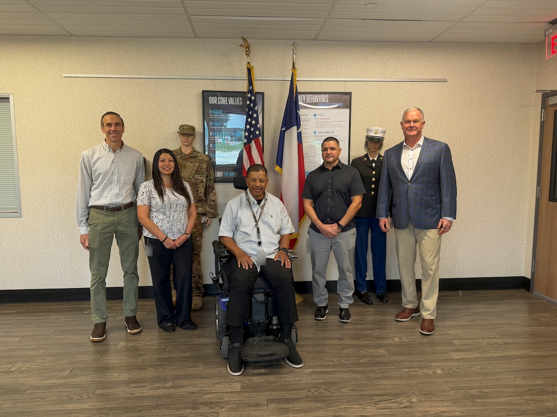 Leaders and subject matter experts from the Defense Logistics Agency Troop Support and Travis Association for the Blind pose for a group photo during a site visit in Austin, Texas, April 30, 2026. The visit was part of a proactive DLA Troop Support effort to prepare the key vendor for an upcoming financial audit and ensure enterprise-wide supply chain readiness.