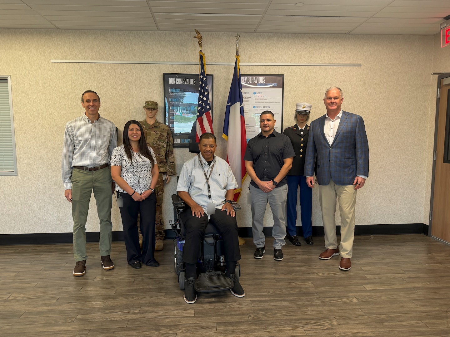 Leaders and subject matter experts from the Defense Logistics Agency Troop Support and Travis Association for the Blind pose for a group photo during a site visit in Austin, Texas, April 30, 2026. The visit was part of a proactive DLA Troop Support effort to prepare the key vendor for an upcoming financial audit and ensure enterprise-wide supply chain readiness.