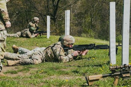 Indiana National Guard Spc. Caleb Chambers, an infantryman with the 1st Battalion, 151st Infantry Regiment, fires an M240 machine gun during a qualification event at the Region IV Best Warrior Competition at Fort Custer Training Center, Michigan, April 30, 2026.