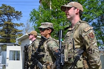 U.S. Air Force Airmen assigned to the 31st Combat Air Base Squadron maintain security at an entry control point during exercise Freedom Flag 26-1 at Gwangju Air Base, Republic of Korea, April 21, 2026. Throughout the exercise, 31st CABS demonstrated its ability to provide critical sustainment, including food, medical, fuel, and security services, at a main operating base and during dispersed operations. (U.S. Air Force photo by Senior Airman Ty Pilgrim)