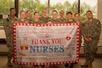 BREMERTON, Wash. – U.S. Navy Nurse Corps officer stationed at Navy Medicine Readiness and Training Command Bremerton celebrate National Nurses Week, May 6-12, 2026, which culminated with the Navy Nurse Corps birthday, May 13. The weeklong celebration honors the dedication, skill, and history of the Navy Nurse Corps and their civilian registered nurse counterparts. Established by Congress on May 13, 1908, the Navy Nurse Corps comprises more than 4,000 active duty and reserve officers, who work alongside dedicated federal civil service nurses to provide critical healthcare services globally and locally. The annual weeklong observance recognizes the vital role this integrated nursing team plays in maintaining force medical readiness, optimizing patient outcomes, and providing compassionate care to Sailors, Marines, retirees, and their families throughout the Pacific Northwest.(official Navy photo by Mass Communication Specialist 1st Class Jennifer Benedict, Public Affairs, NHB/NMRTC Bremerton).