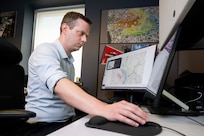 Adam Moses, U.S. Naval Research Laboratory (NRL) computer scientist, runs an Android Tactical Awareness Kit (ATAK) plugin in Washington, D.C., April 24, 2026. CT-Analyst is an NRL developed tool that models airborne hazards in real time while the ATAK plugin enables the development of new features and eases deployment. (U.S. Navy photo by Sarah Peterson)