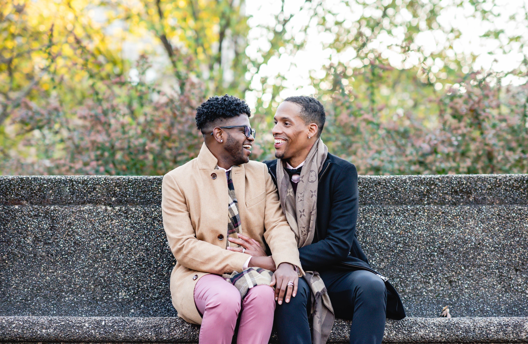 U.S. Air Force Master Sgt. Kymon G. Carriker, left, development advisor with the 11th Force Support Squadron and 811th Force Support Squadron, smiles with his late husband, Marcus Carriker, right, in 2021. The couple married in 2020 and Marcus passed away from leukemia Feb. 24, 2024. (courtesy photo)