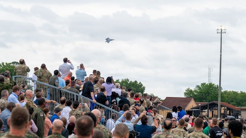 Gathering of Eagles and National Security Forum attendees watch the F-22 Demonstration Team perform during a demonstration at Maxwell Air Force Base, Alabama, May 6, 2026.