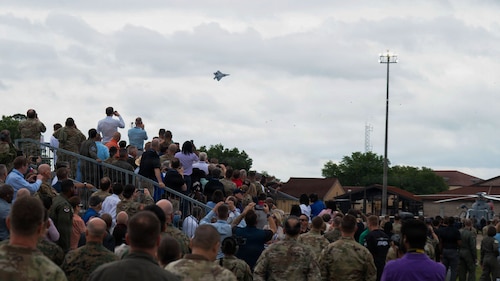 Gathering of Eagles and National Security Forum attendees watch the F-22 Demonstration Team perform during a demonstration at Maxwell Air Force Base, Alabama, May 6, 2026.