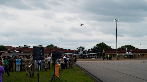 Gathering of Eagles and National Security Forum attendees watch the F-22 Demonstration Team perform during a demonstration at Maxwell Air Force Base, Alabama, May 6, 2026.